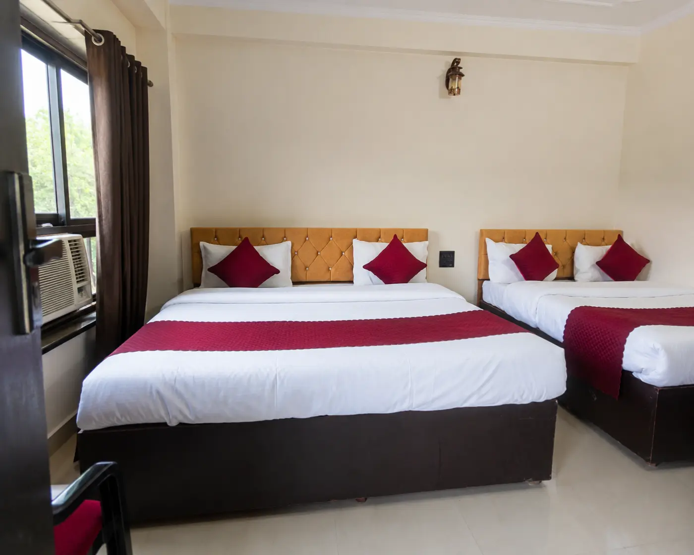 Quad sharing family room at Hotel Mithila Haridwar